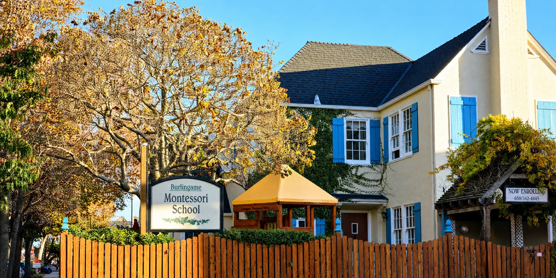 Burlingame Montessori School on California Drive, seen from the street on an autumn afternoon